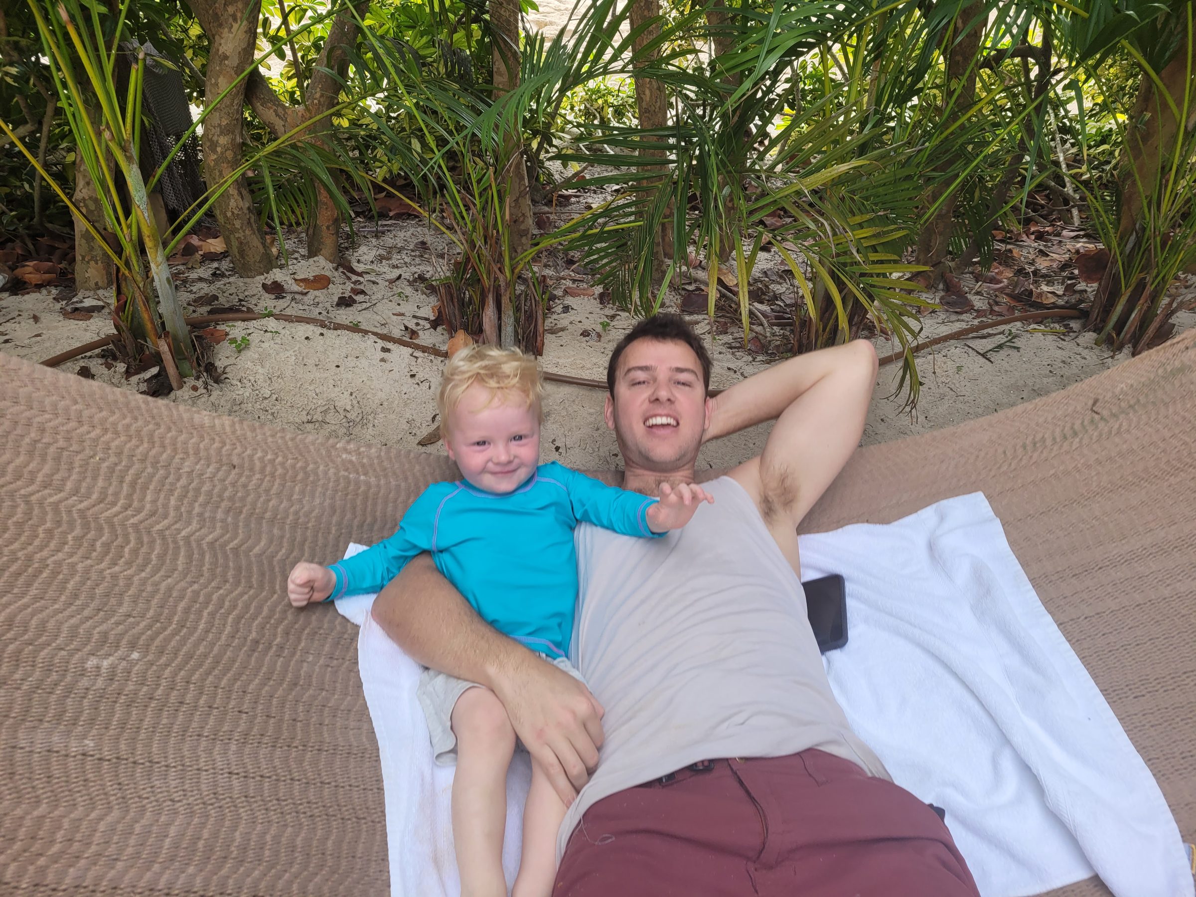 Jim and Raccoon in the cabana hammock at Discovery Cove